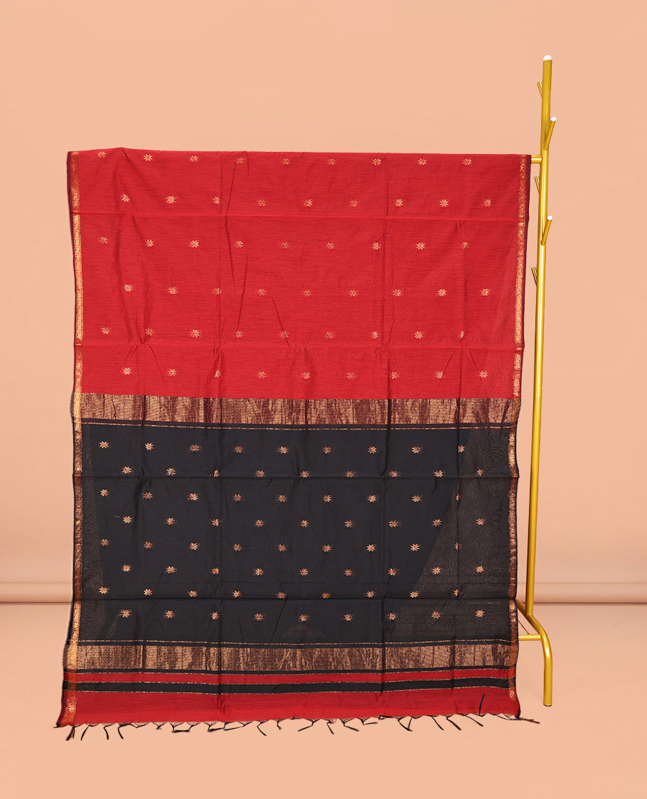 Red Maheshwari Cotton Saree, Spotlighted with Buttas All Over Its Body, Subtle Zari Piping Border, Complemented by a Contrast Pallu Steeped with Buttas, and Paired with a Contrast Blouse