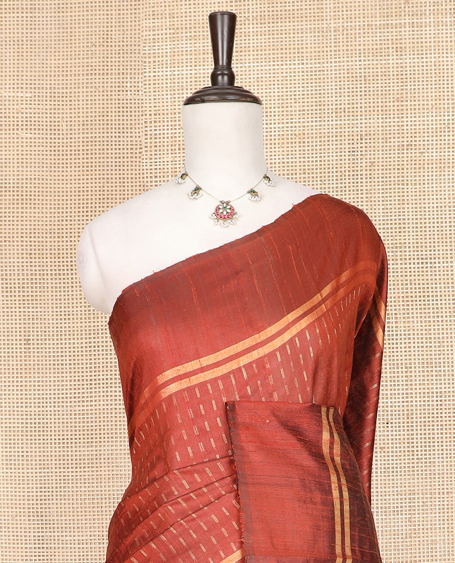 Rust Orange Dupion Silk Saree Beautified with Dobby-Style Buttas All Over Its Body, Zari Striped Border, Pallu Steeped with Square Designs, and Paired with a Matching Blouse