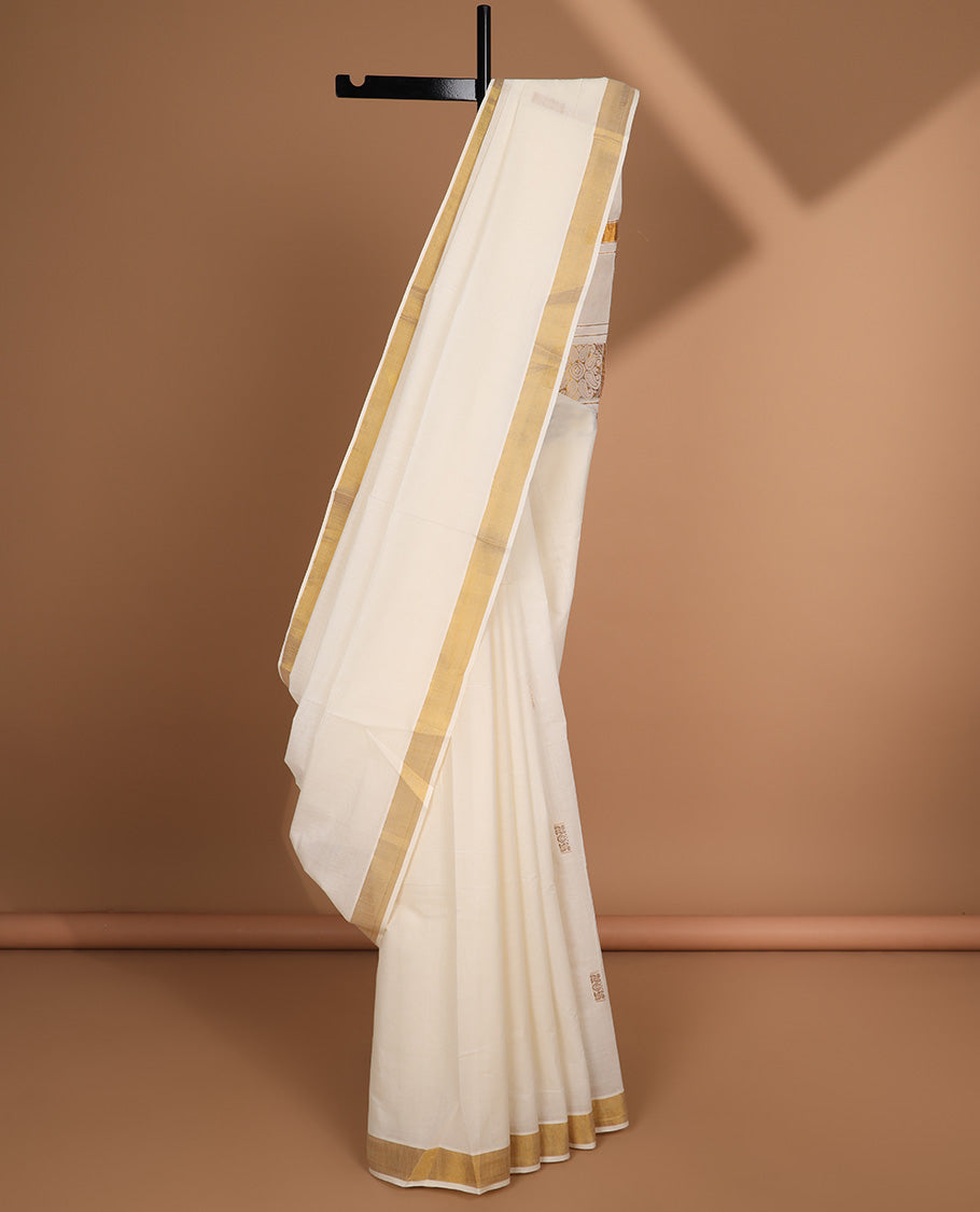 Cream plain kerala saree, plain border & pallu of zari paisley designs
