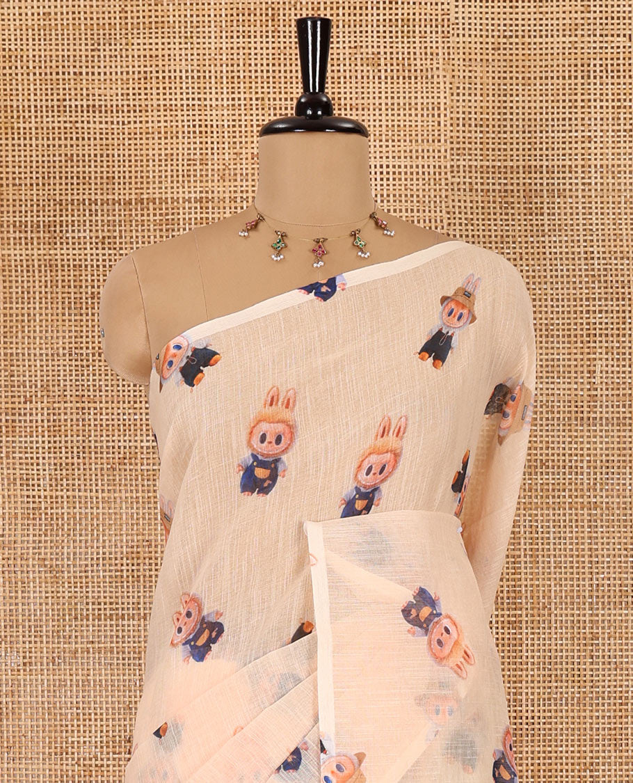 Borderless light orange labubu toy motifs printed linen cotton saree with a matching labubu toy s printed blouse