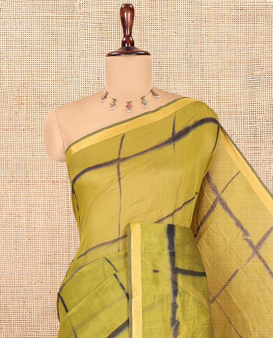 Green Linen Cotton Saree, Adorned with Shibori Checks, a Subtle Piping Border, Geometric Pallu, and a Matching Blouse