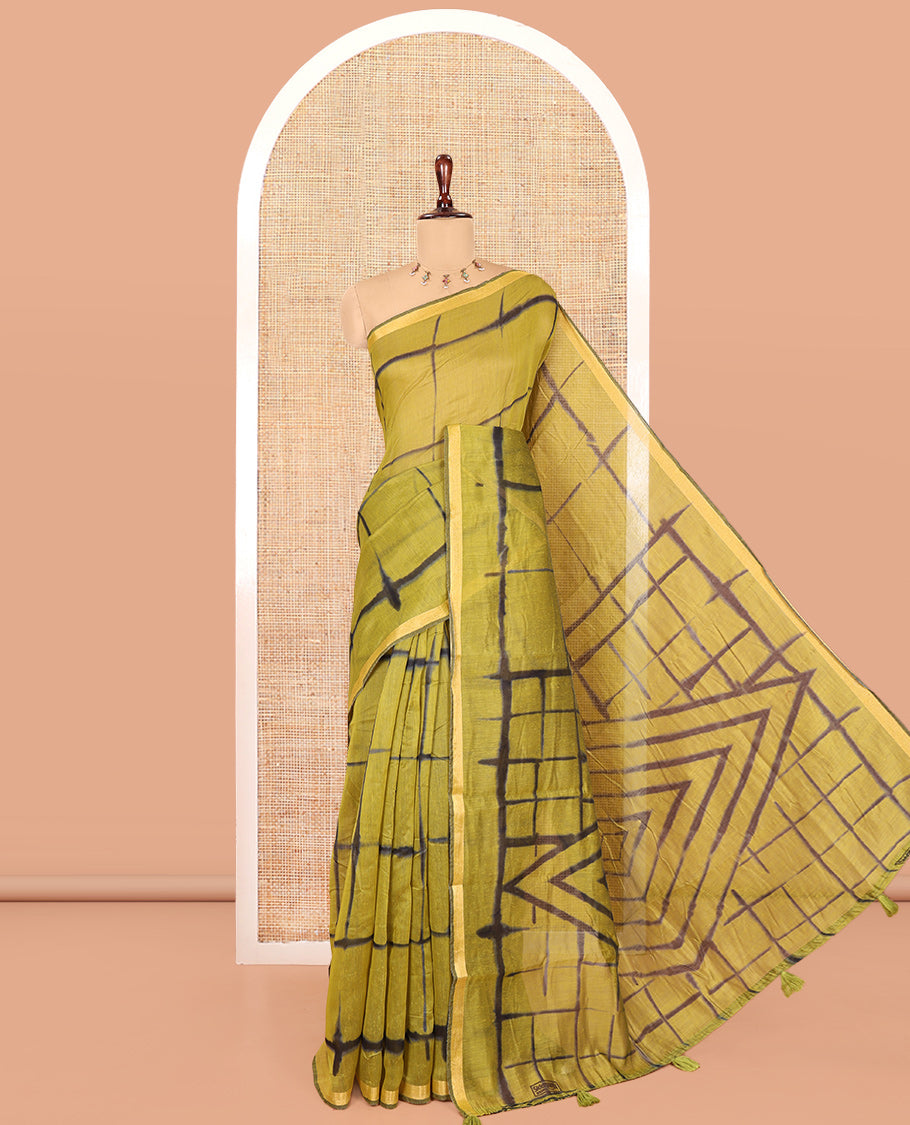 Green Linen Cotton Saree, Adorned with Shibori Checks, a Subtle Piping Border, Geometric Pallu, and a Matching Blouse