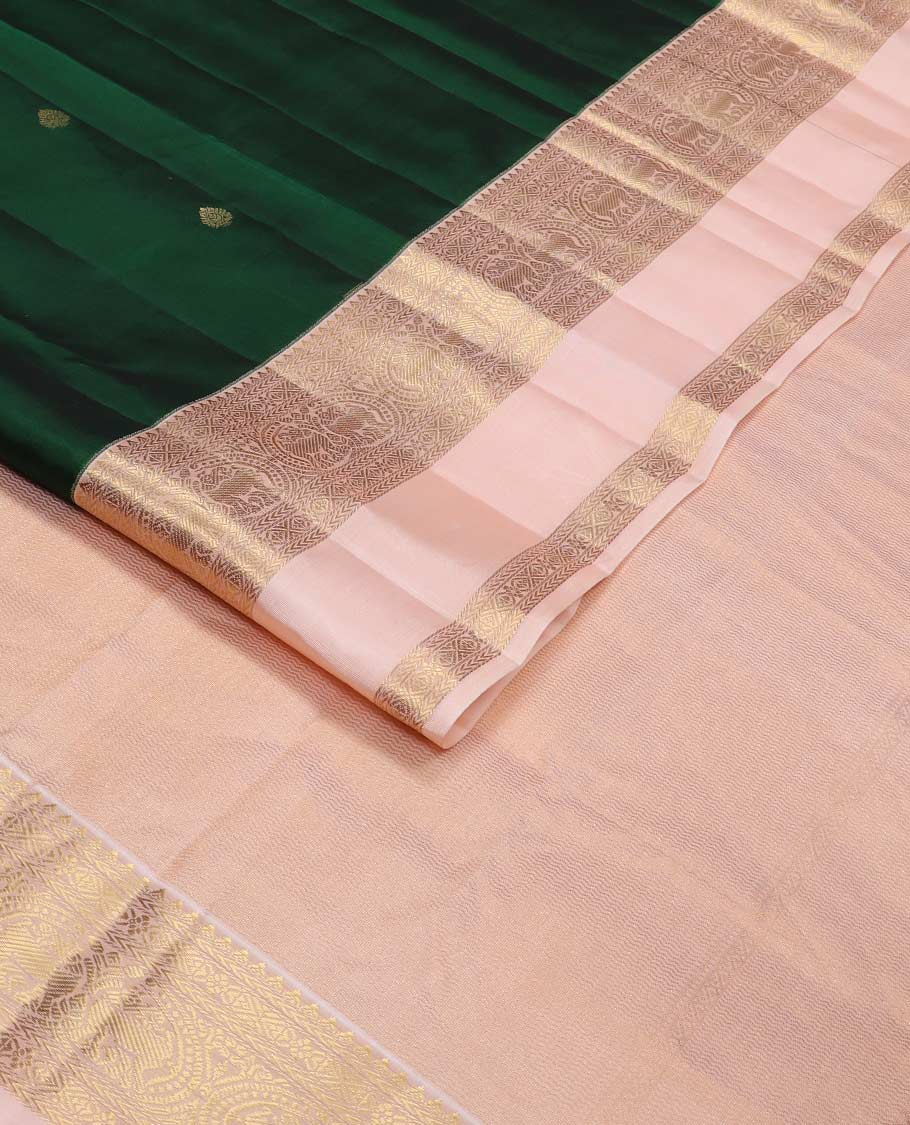 Green zari buttas Vasundhara silk mix saree, contrast rettai pettu border of rekku, kathir, round yaali, and zari designs, and vanki design pallu