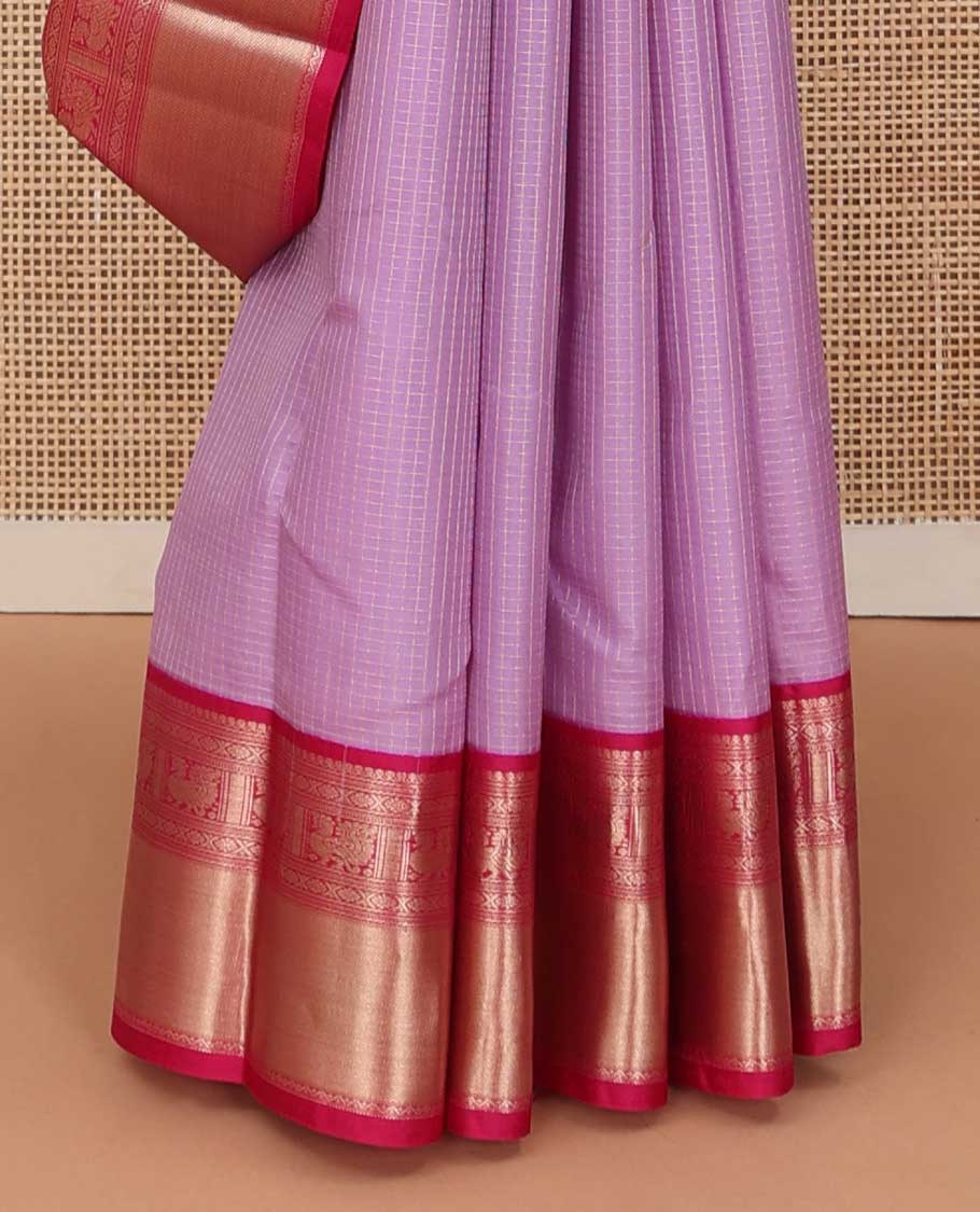 Pink zari striped silk saree, contrast border of salngai, cross kamalam, neli, and mayil designs and jaal pallu