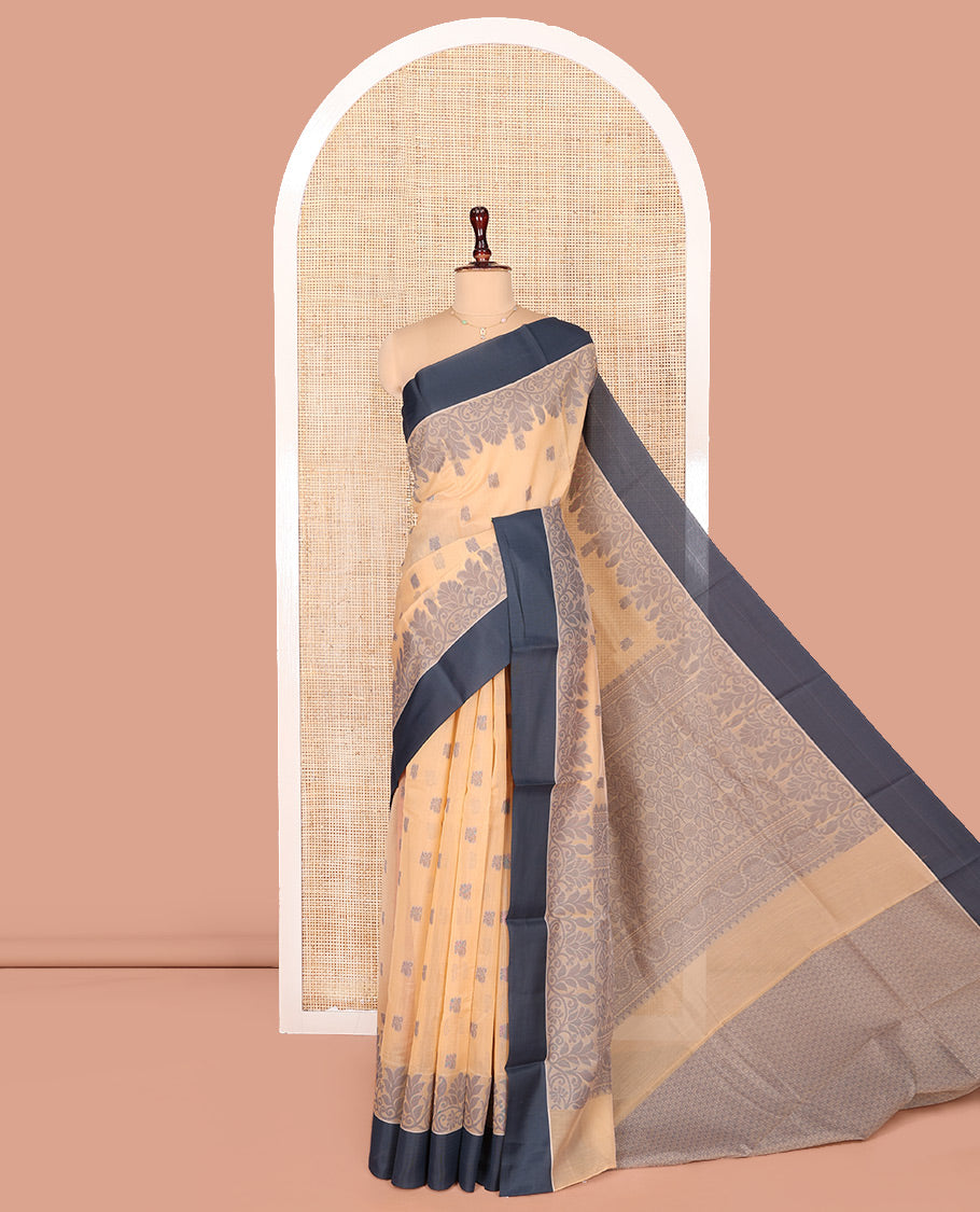 Sandal Semi-Silk Cotton Saree, Sparsely Woven with Floral Buttas on Its Body, Complemented by Contrast Border, Pallu Steeped with Floral Designs, and Paired with a Matching Blouse