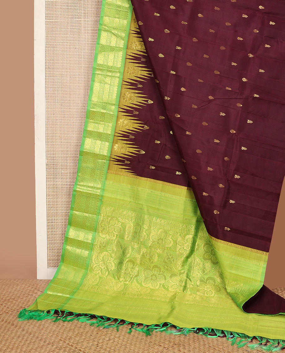Maroon buttas Kanchipuram silksaree, contrast one-sided temple border of salngai,banaras,cross kamalam & laddu kamalam & floral pallu