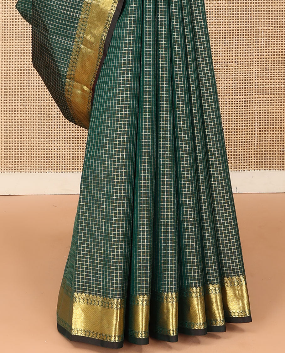 Green zari checked Kanchipuram silk saree, zari border of thilakam mokku, muthu, and manga designs, and jaal pallu
