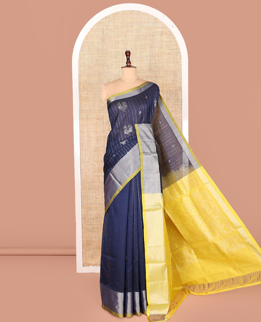 Blue Kuppadam Cotton Saree, Bedecked with Dotted Stripes and Peacock Buttas All Over Its Body, Complemented by a Bavanji Border, Pallu Elevated with Intricate Designs, and Paired with a Contrast Blouse