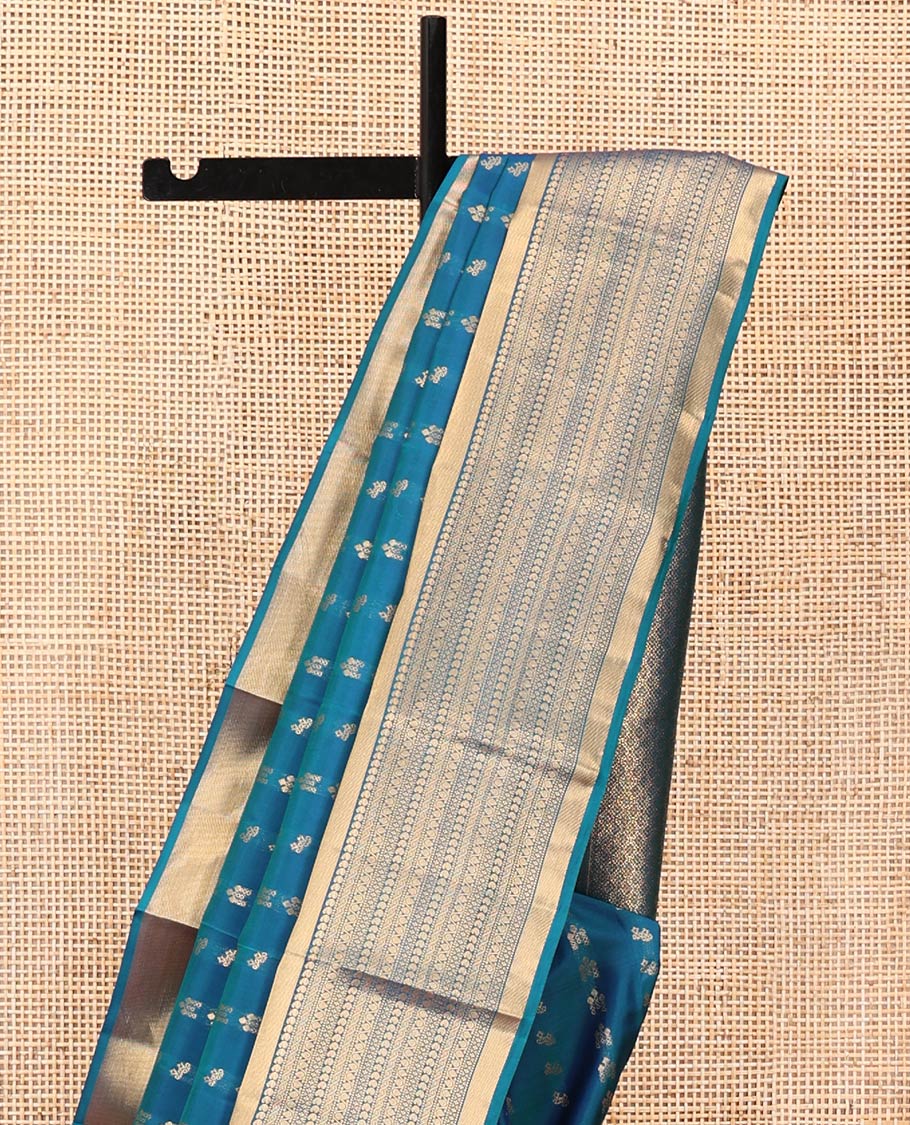 Blue Vasundhara Lite Silk Mix Saree, Steeped with the Richness of Zari Buttas All Over Its Body, Highlighted by Zari Border of Manga, Muthu, and Kodi Visiry Designs, Grand Jaal Pallu and Paired with a Matching Blouse