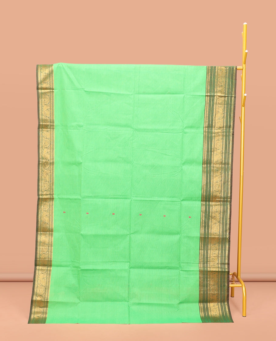 Green Chettinad Cotton Saree, Detailed with Buttas All Over Its Body, Complemented by a Contrast Traditional Zari Design Border, Pallu of Stripes and Buttas, and Paired with a Matching Blouse