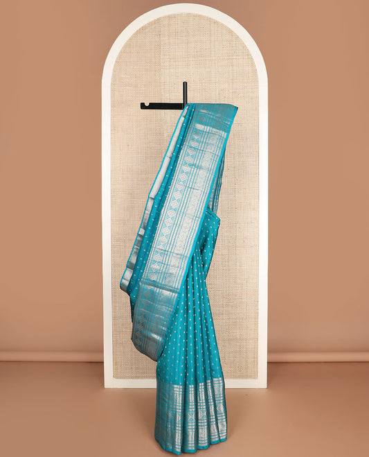 Blue zari buttas vasundhara silk mix saree, intricate pallu & border of muthu,kathir,rudraksham, diamond,4-petal flower & floral designs