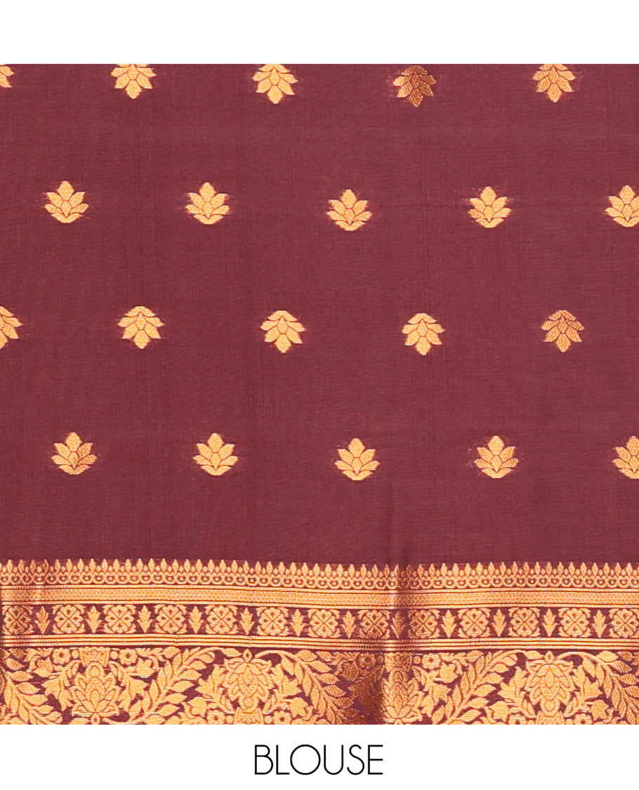 Rust Orange Kanchi Soft Silk Saree, Subtly Sparkled with Zari Buttas All Over Its Body, Complemented by a Contrast Chakram Motifs Border, an Intricately Designed Pallu, and Paired with a Contrast Blouse