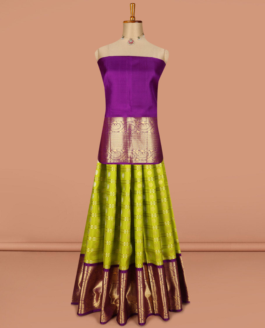 Green pure silk half saree, mayil chakram buttas skirt, contrast blouse of border of thilakam, poun, mayil kann, and dhavana kodi, and arumbu manga design pallu