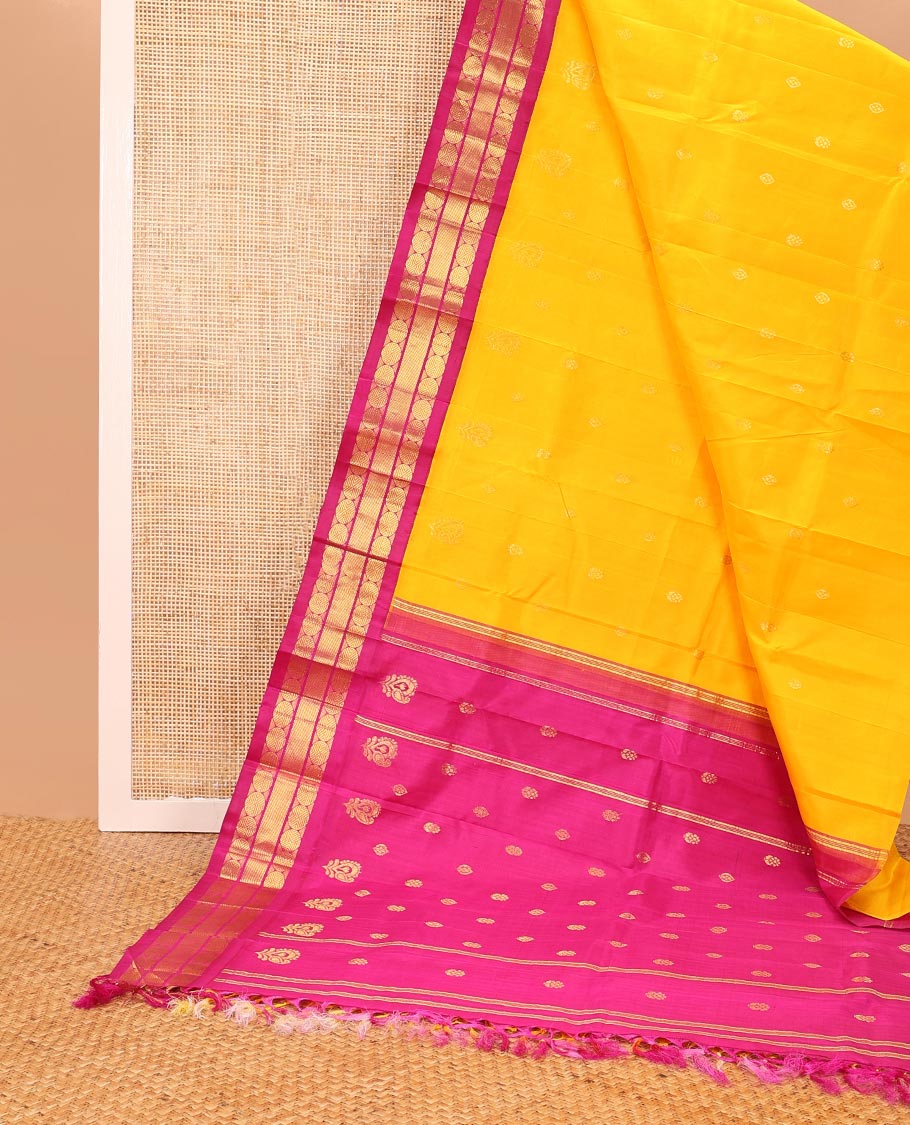 Yellow buttas kancheepuram silk saree with contrast korvai border of paun, banaras design & zari design pallu