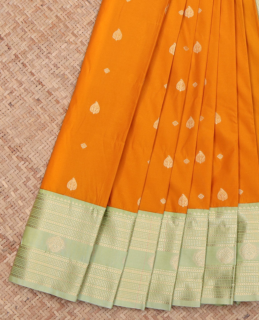 Orange Budget Silk Saree, Featuring Zari Buttas All Over Its Body, Complemented by a Contrast Traditional Zari Design Border, a Pallu Steeped with Traditional Design, and Paired with a Contrast Blouse