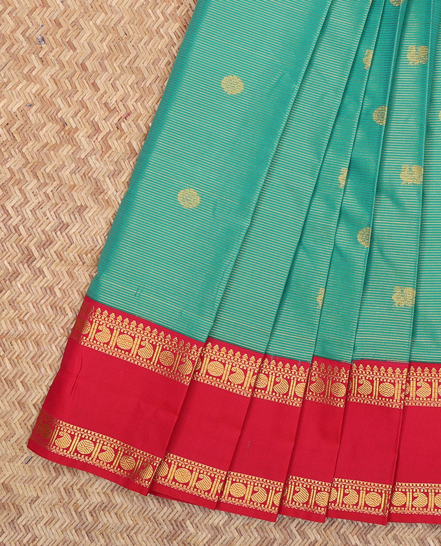 Green Budget Silk Saree, Beautified with Peacock-Chakram Buttas and Stripes, a Contrast Traditional Zari Rettai Pettu Border, Grand Pallu, and a Contrast Blouse