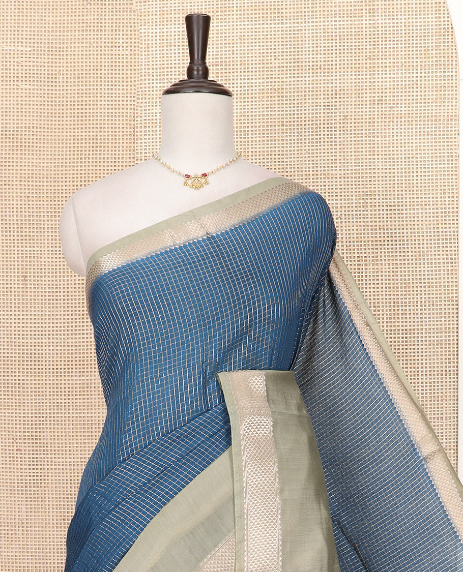 Blue Assam Silk Saree Graced with Zari Checks, Complemented by Contrast Zari Border of Triangle Motifs, a Gleaming Pallu of Zari Stripes, and Paired with a Contrast Blouse