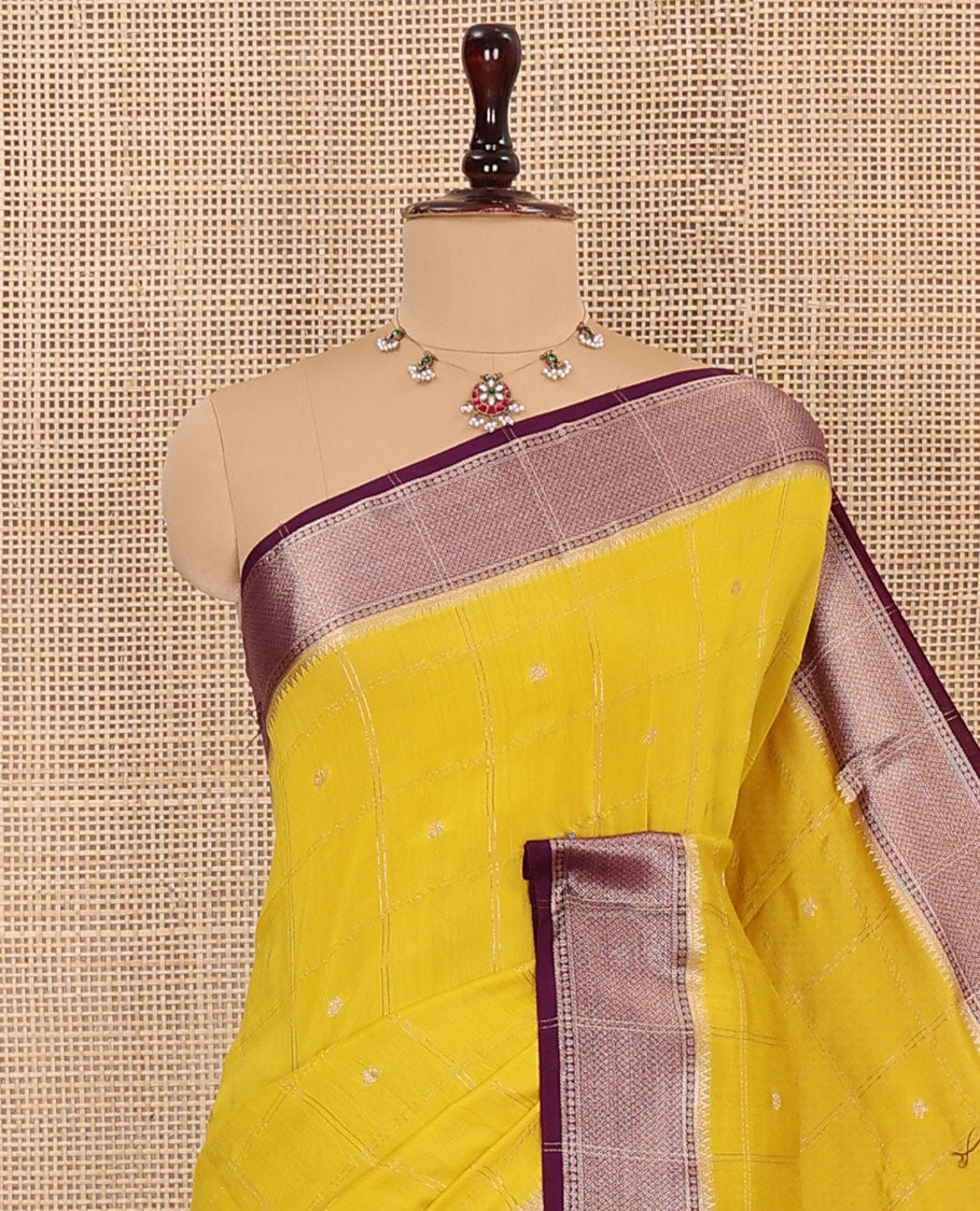 Yellow Assam Silk Saree Adorned with Zari Butta Enclosed Checks, Complemented by Captivating Contrast Traditional Zari Design Border, Gleaming Zari-Woven Pallu, and Paired with a Contrast Blouse