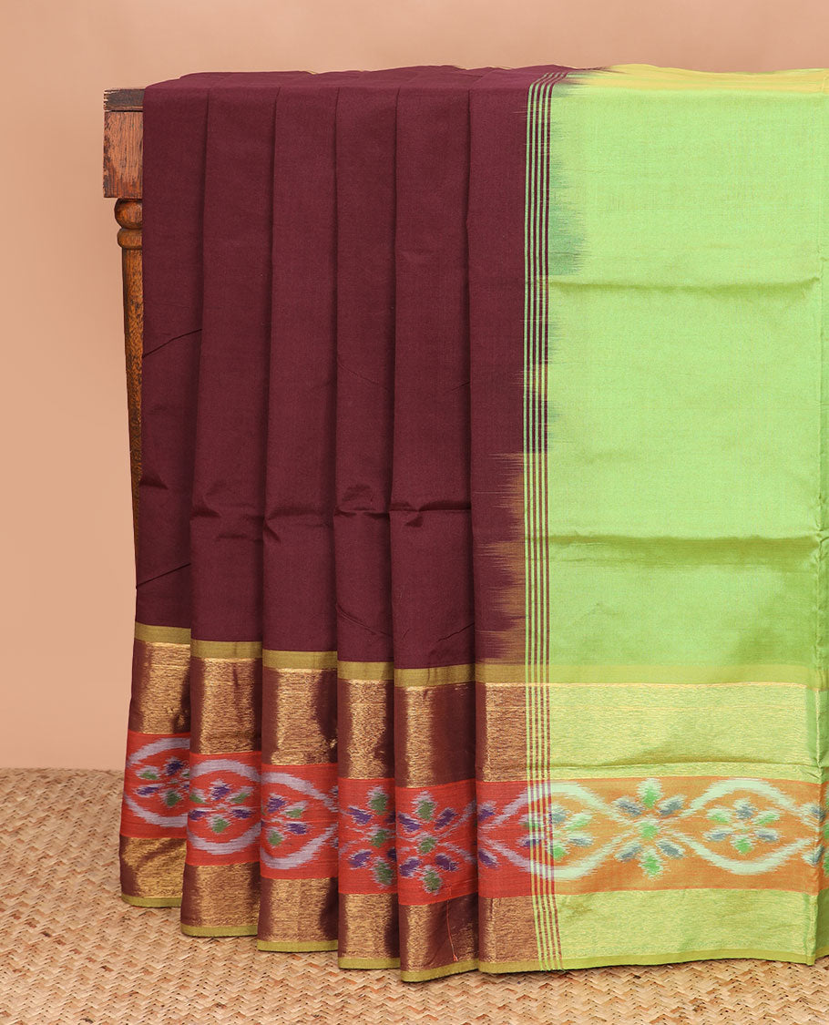Maroon plain poly cotton saree, contrast ikat zari border, and pallu of stripes
