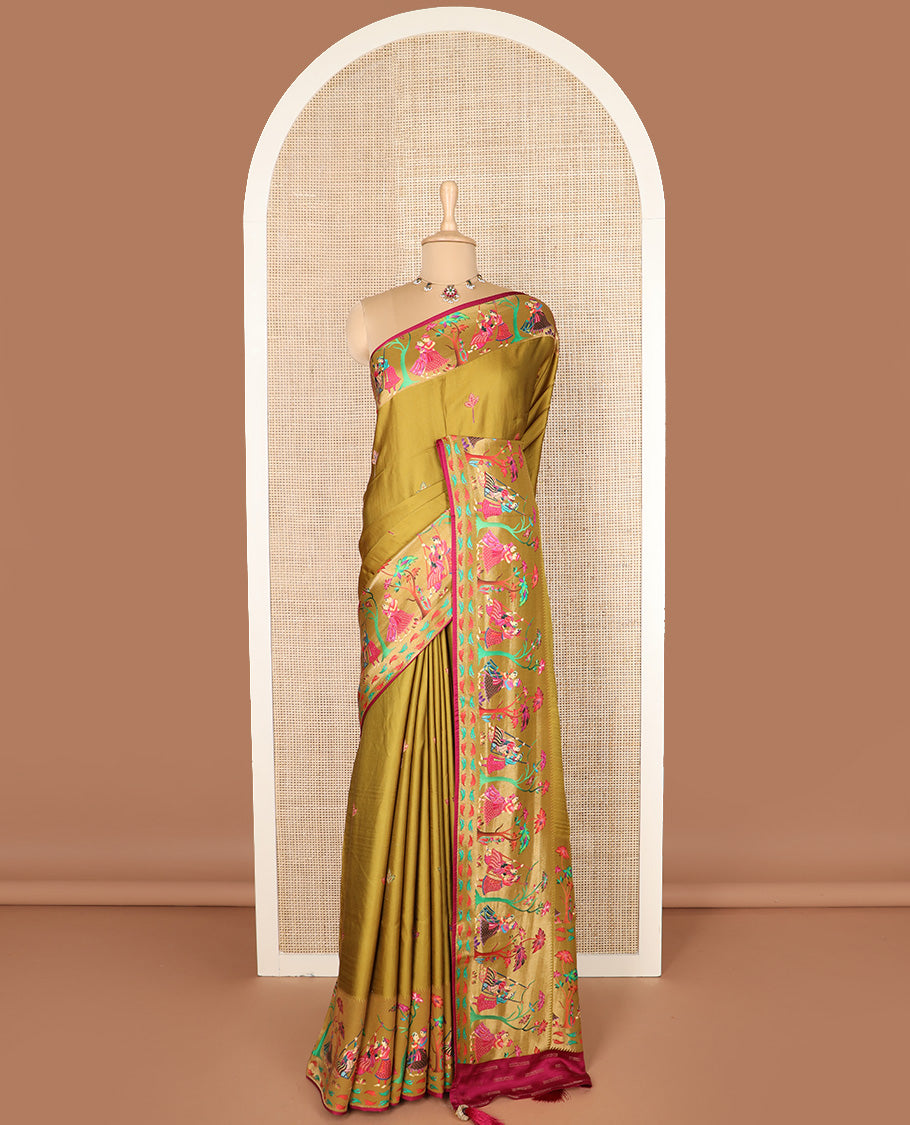 Green unique motifs printed dola silk saree, gleaming zari border, and pallu of Mughal-style man and women motifs