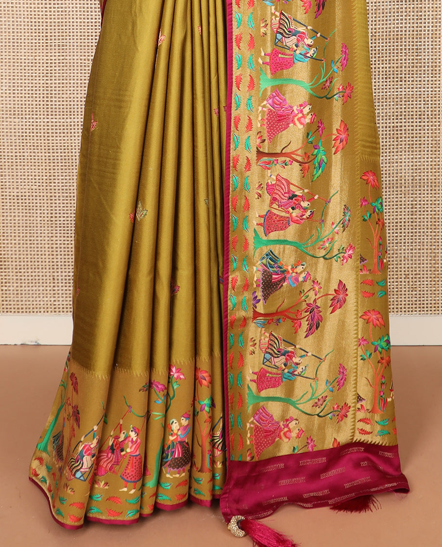 Green unique motifs printed dola silk saree, gleaming zari border, and pallu of Mughal-style man and women motifs