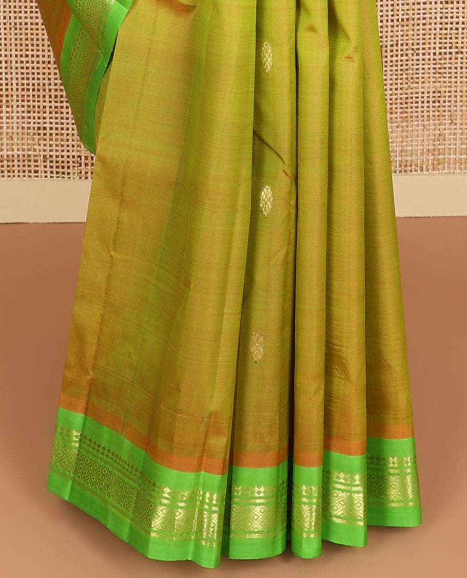 Green buttas kancheepuram silk saree with contrast border of zari design & striped, floral design pallu