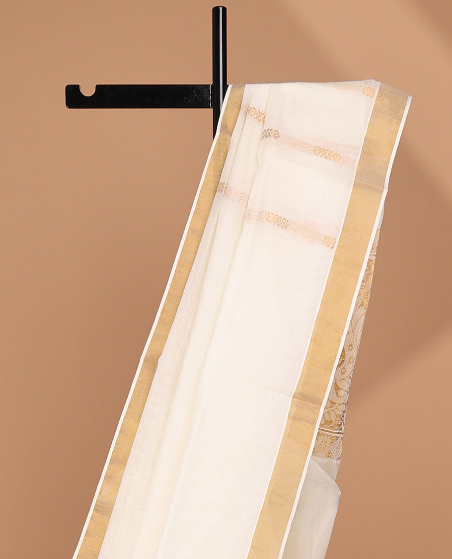 Cream kerala saree with zari stripes, zari border & pallu of intricate designs