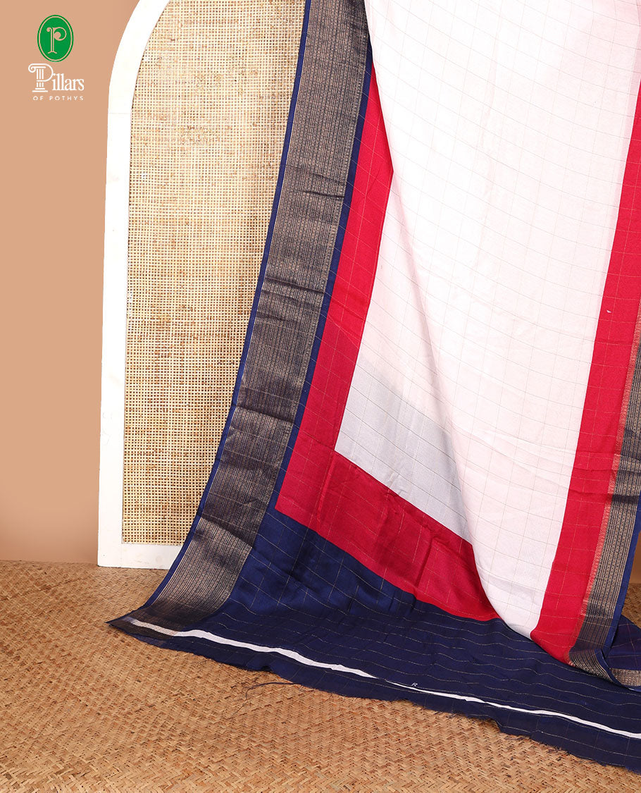White with navy blue zari checked design moss georgette saree with contrast zari jacquard border & printed pallu along with checked blouse