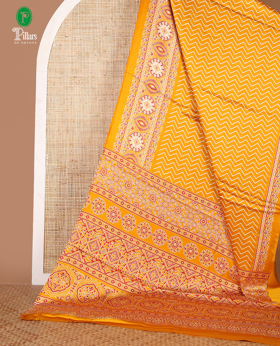 Yellow zig zag digital printed design gajji silk saree with ajrak printed border & ajrak printed pallu along with printed blouse
