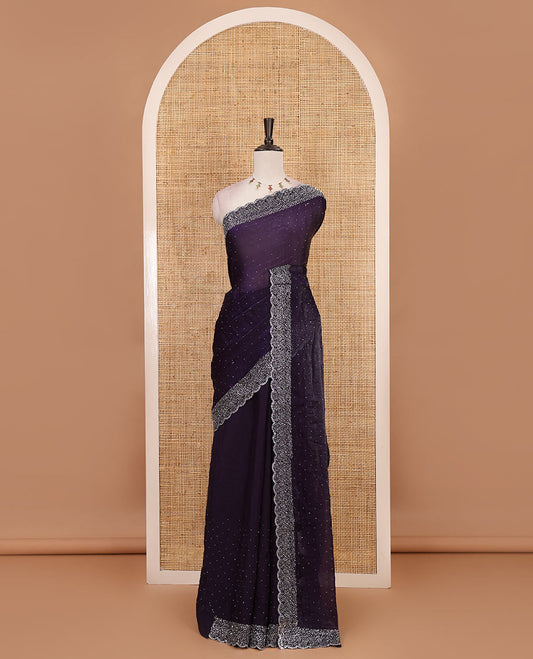 Violet Swarovski crystal stone embedded fendy chiffon saree, scallop Swarovski stone embroidered border, and contrast plain blouse