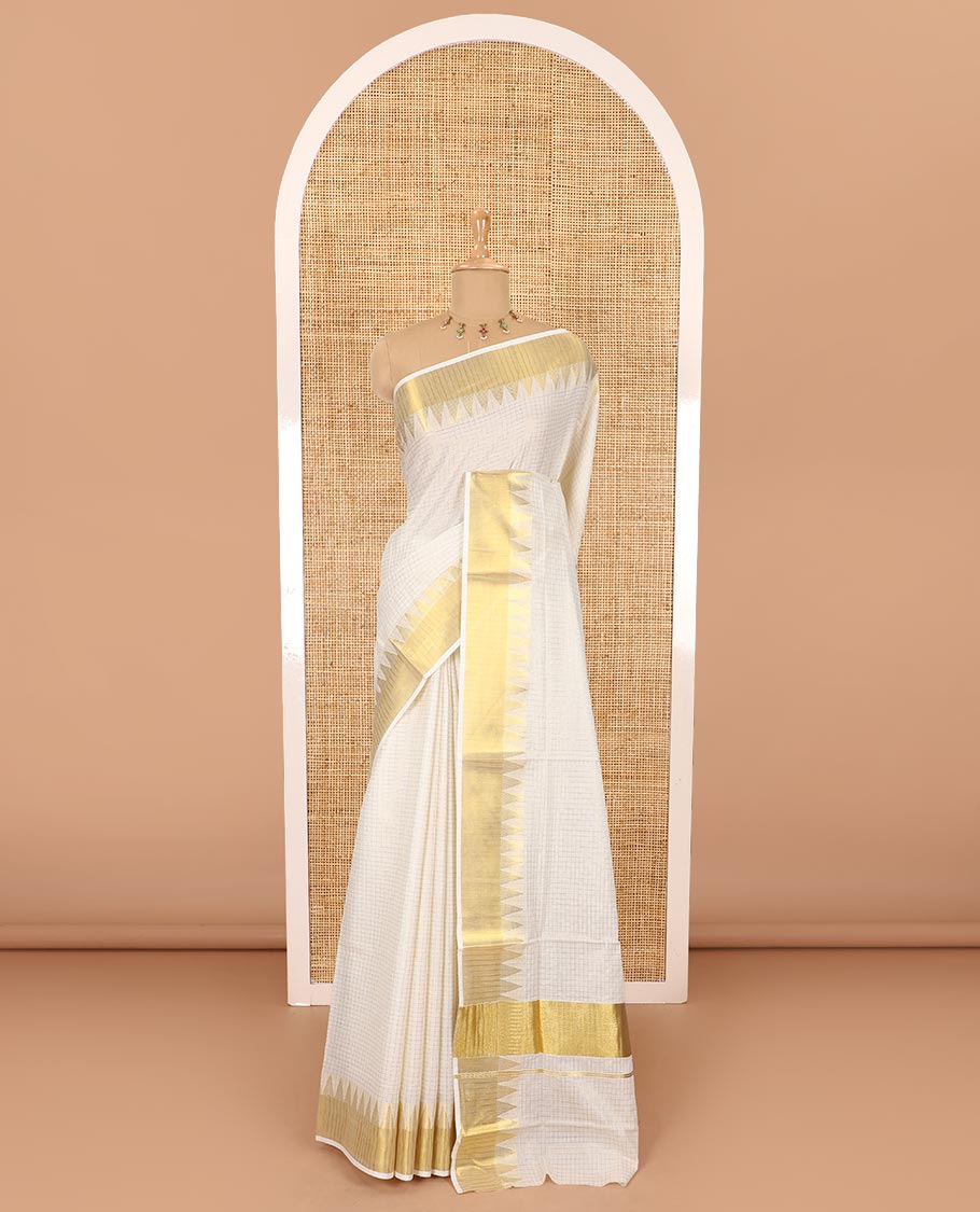 Cream golden zari checked woven Kerala cotton saree, zari temple bavanji border, striped pallu, and a matching blouse