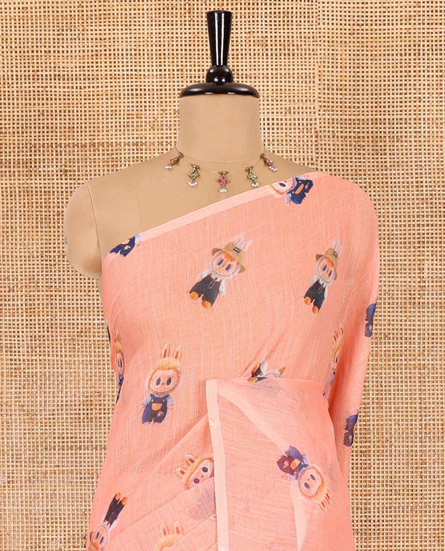 Borderless peach labubu toy motifs printed linen cotton saree with a matching labubu toy s printed blouse