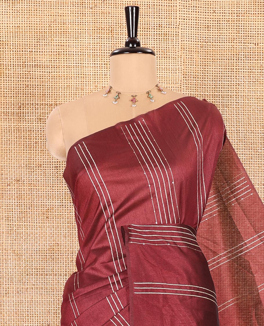 Borderless Maroon Semi-Raw Silk Saree Featuring Elegant Vertical Sequin Stripes Running Across the Body, Complemented by a Contrast Thread-Work Pallu and Paired with a Contrast Blouse