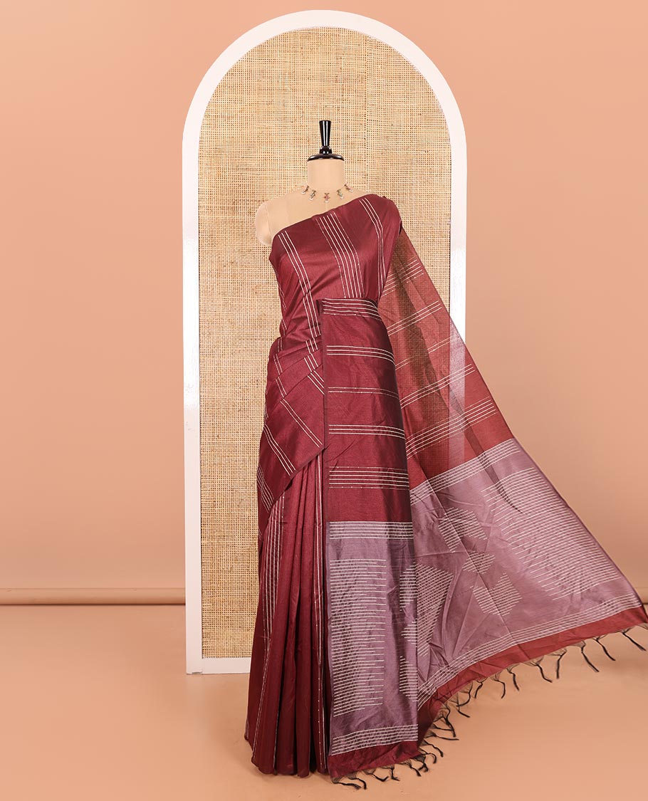 Borderless Maroon Semi-Raw Silk Saree Featuring Elegant Vertical Sequin Stripes Running Across the Body, Complemented by a Contrast Thread-Work Pallu and Paired with a Contrast Blouse