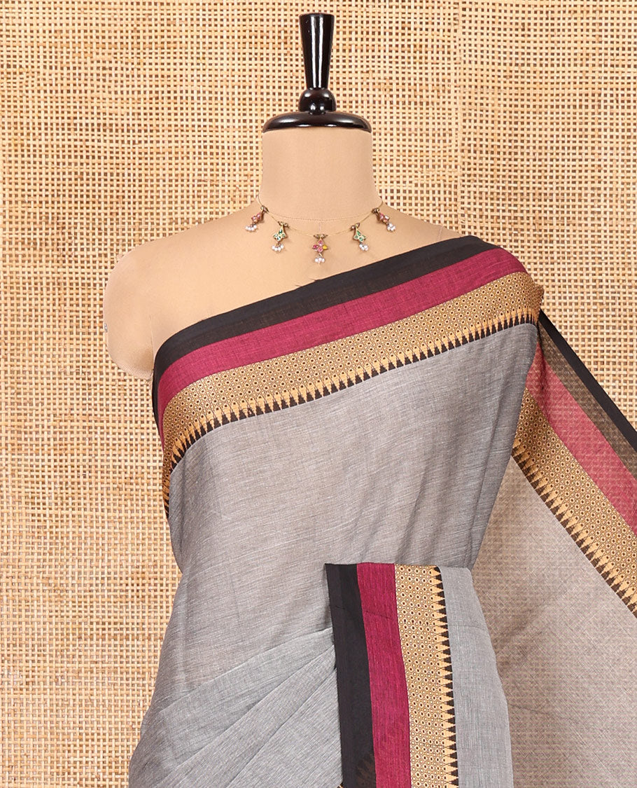 Grey Plain Chettinad Cotton Saree, Complemented by Contrast Traditional Design Temple Border, a Pallu Steeped with Stripes, and Has a No Blouse