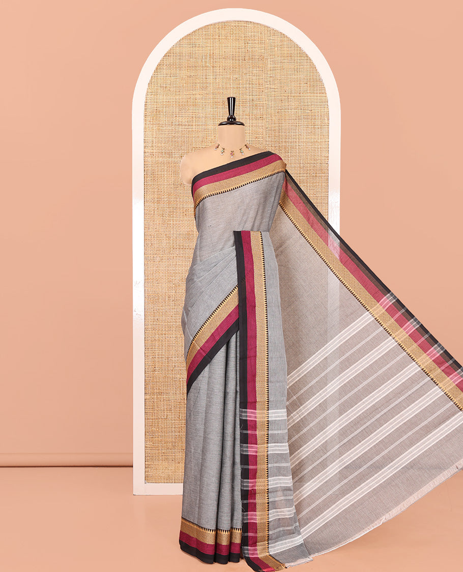 Grey Plain Chettinad Cotton Saree, Complemented by Contrast Traditional Design Temple Border, a Pallu Steeped with Stripes, and Has a No Blouse