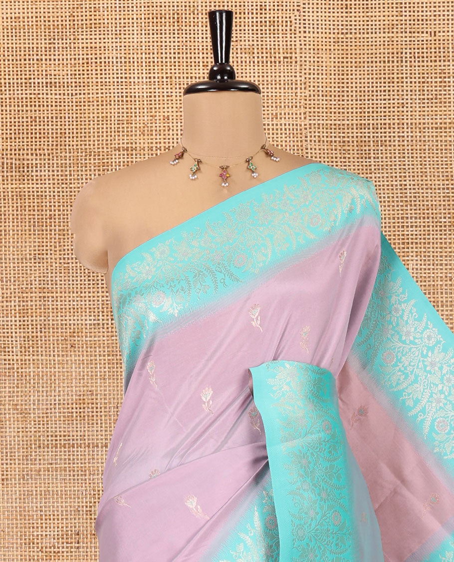 Dusky Pink-Lavender Elite Soft Silk Saree, Adorned with Zari Buttas, Complemented by Contrast Traditional Zari Border, Intricate Pallu and a Contrast Blouse