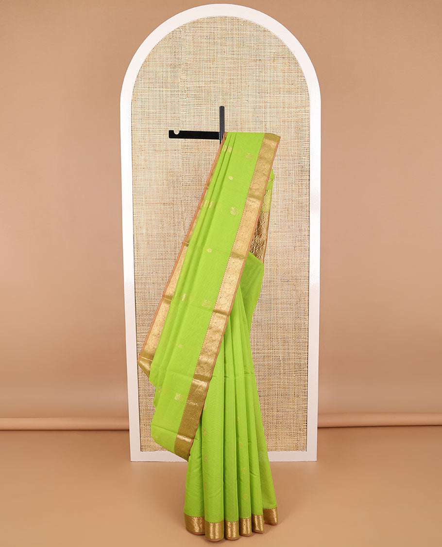 Light green motifs silk cotton saree with intricate zari design border & floral design pallu
