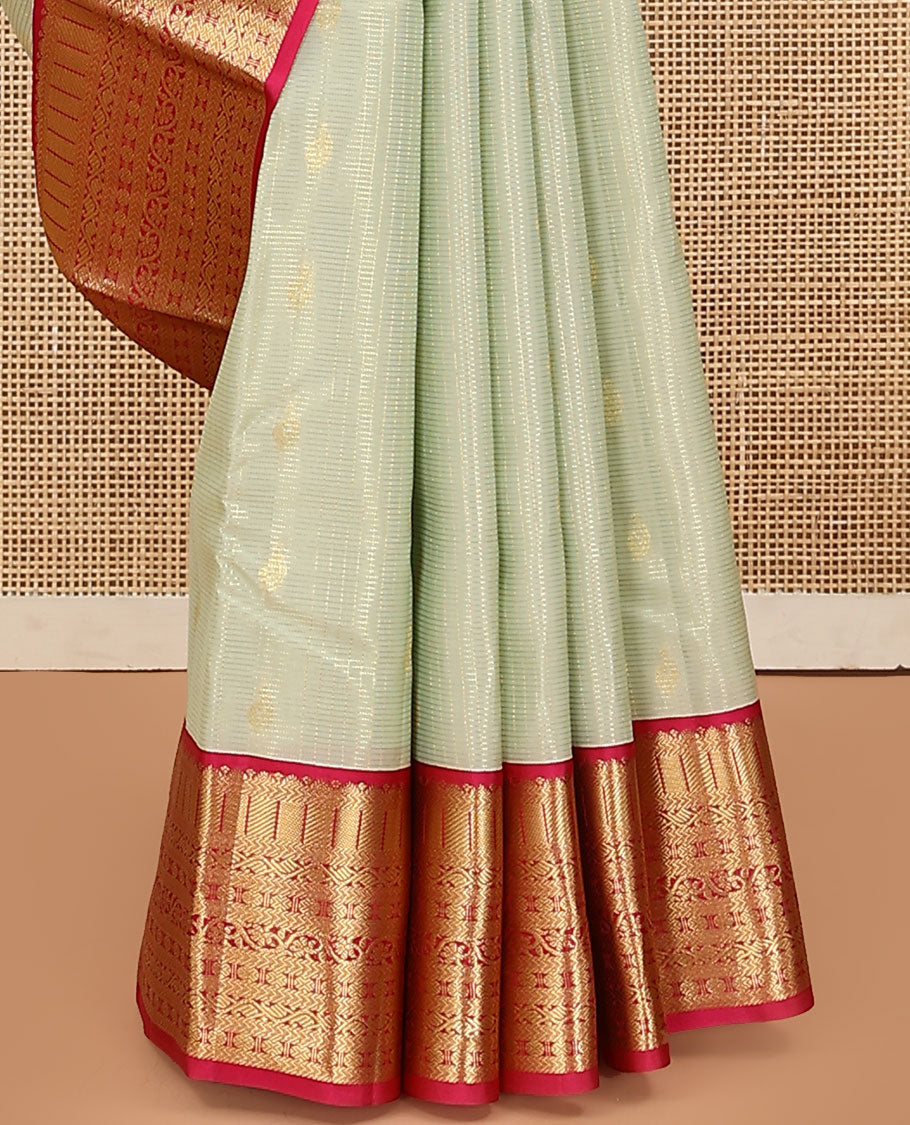 Pale Green Vasundhara Lite Silk Mix Saree, Enriched with Zari Buttas and Stripes on Its Body, Complemented by a Contrast Border of Kathir, Kodi Manga, and Rudraksham Mayil Designs, Majestically Detailed Pallu, and Paired with a Contrast Blouse
