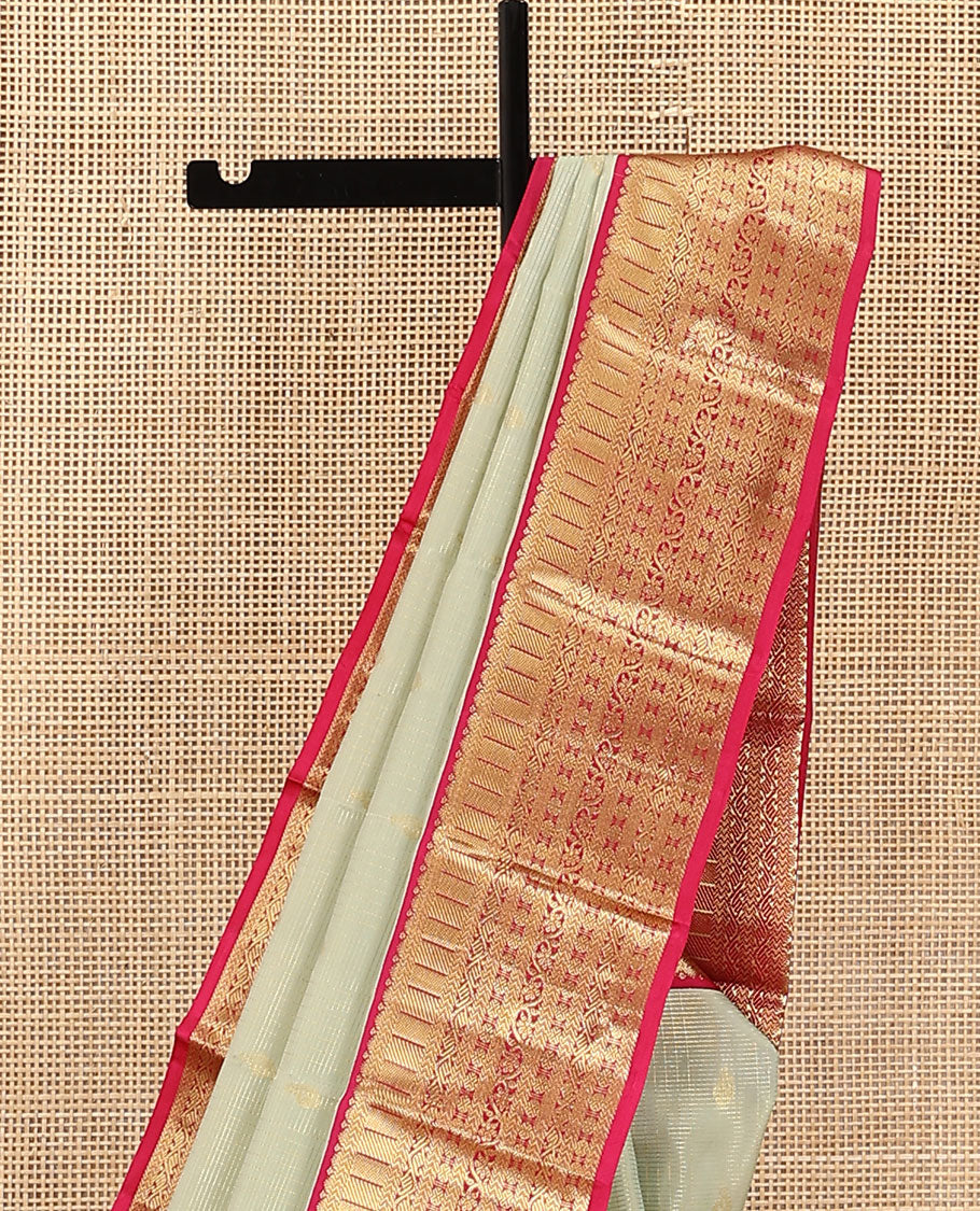 Pale Green Vasundhara Lite Silk Mix Saree, Enriched with Zari Buttas and Stripes on Its Body, Complemented by a Contrast Border of Kathir, Kodi Manga, and Rudraksham Mayil Designs, Majestically Detailed Pallu, and Paired with a Contrast Blouse