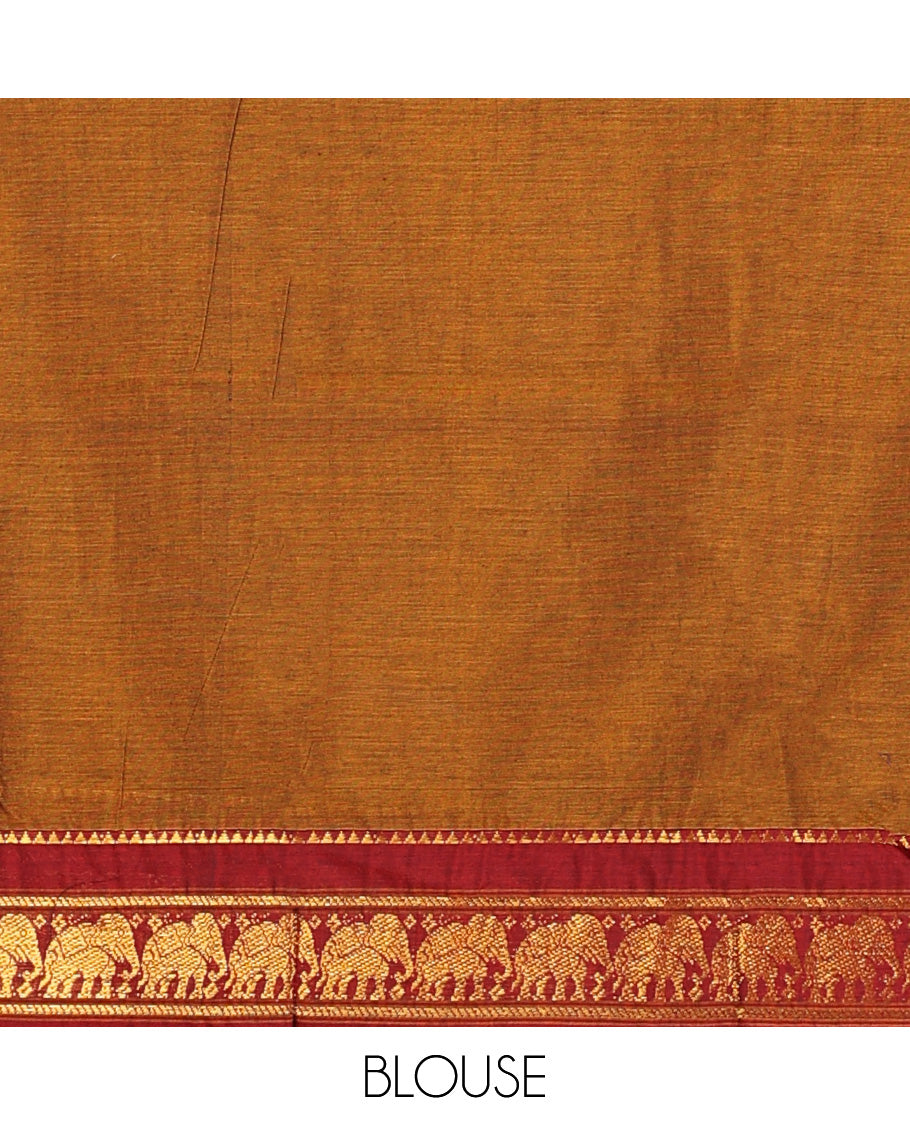 Mustard cotton half-saree, plain with contrast elephant motif bordered skirt, matching blouse, and contrast elephant motif bordered dhavani