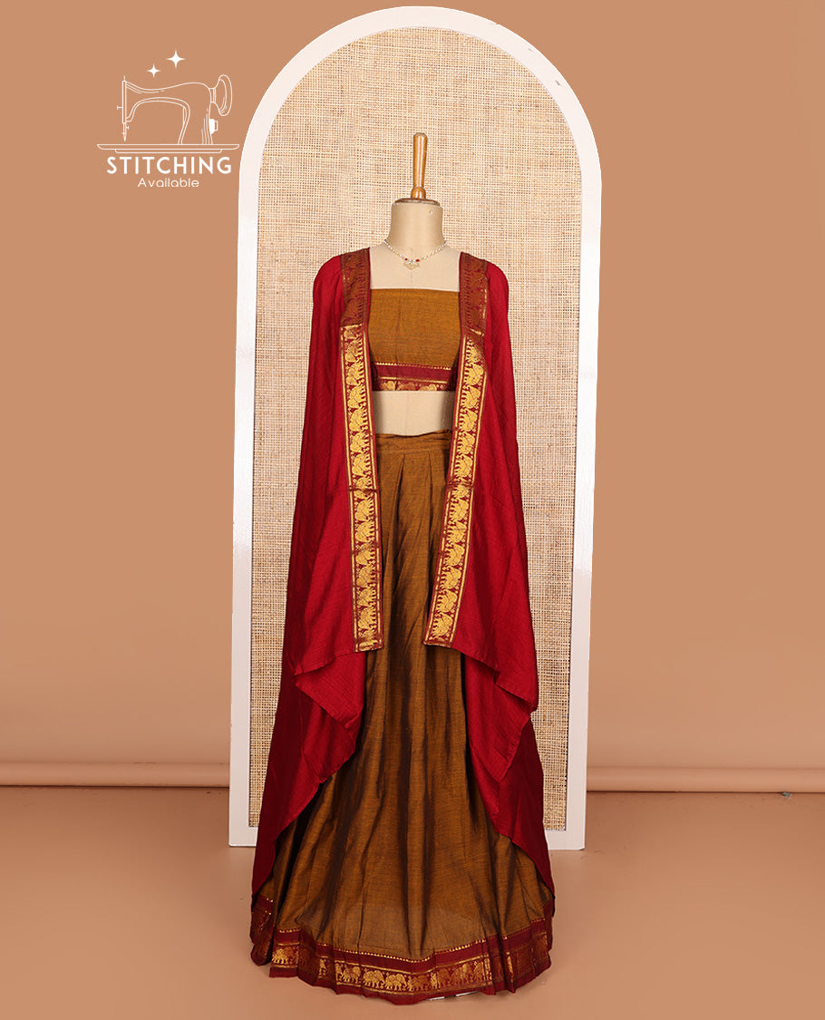 Mustard cotton half-saree, plain with contrast elephant motif bordered skirt, matching blouse, and contrast elephant motif bordered dhavani