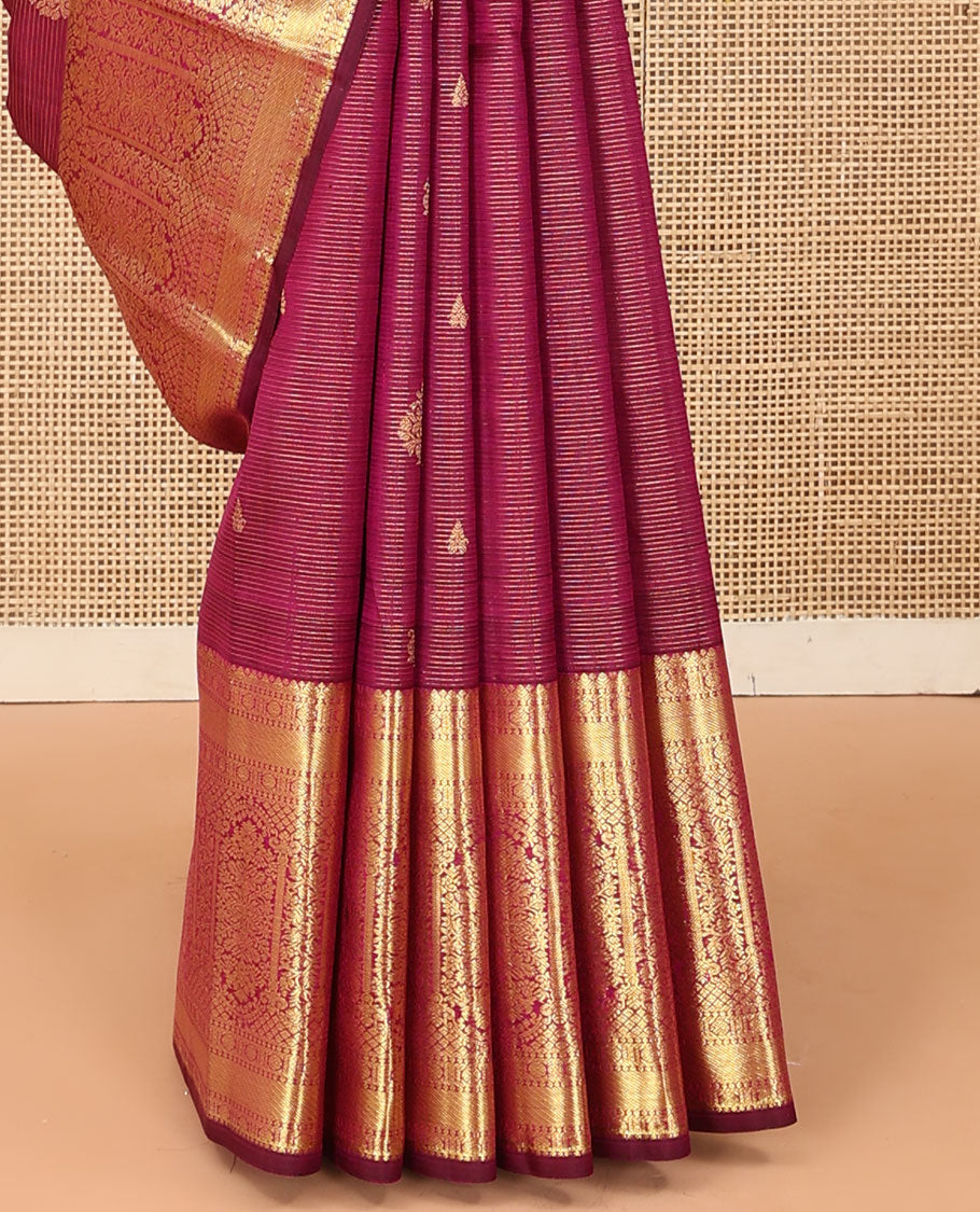 Purple zari stripes and buttas Kanchipuram silk saree, zari border of thilakam, poun, and MUghal-style floral designs, and pallu steeped with manga motifs