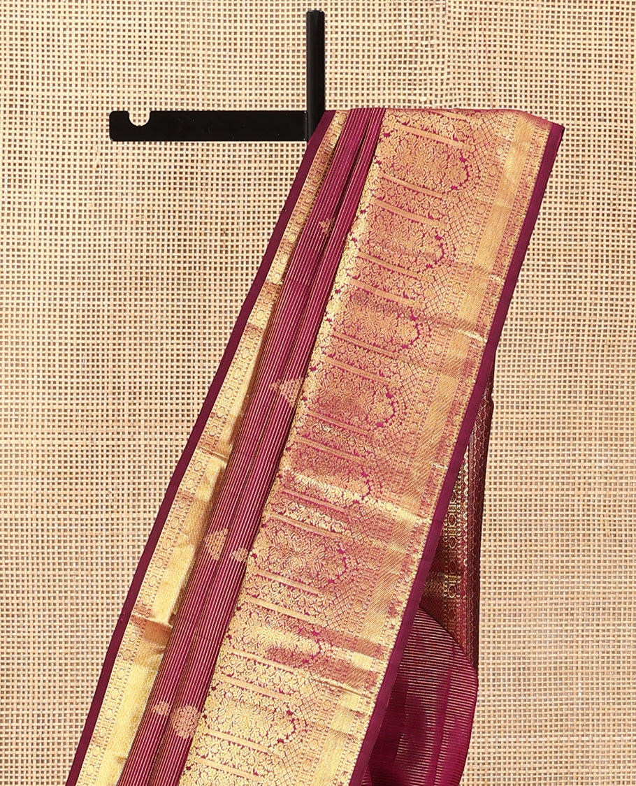 Purple zari stripes and buttas Kanchipuram silk saree, zari border of thilakam, poun, and MUghal-style floral designs, and pallu steeped with manga motifs