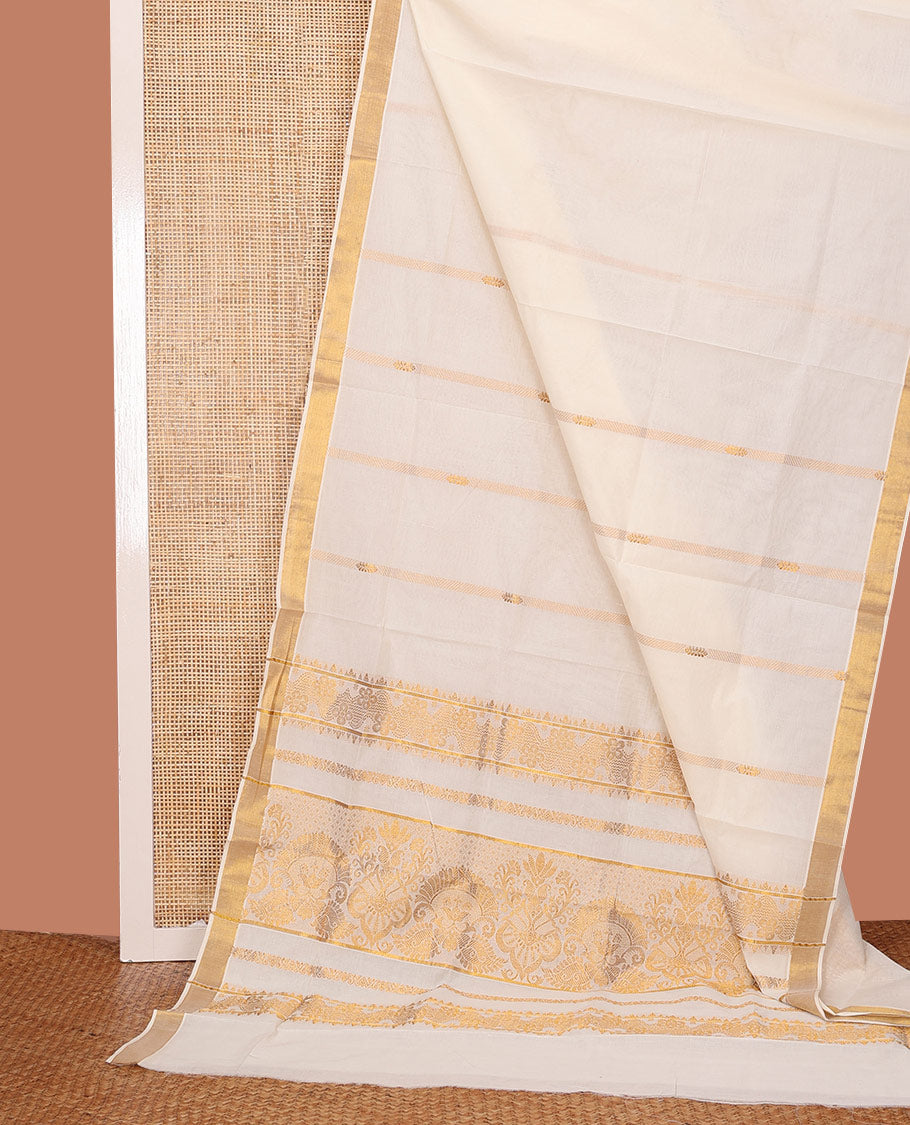 Cream Kerala Saree, Prettified with Zari Stripes on Its Body, Subtly Sparkled Bavanji Border, Gleaming Pallu of Intricate Zari Designs, and Paired with a Matching Blouse