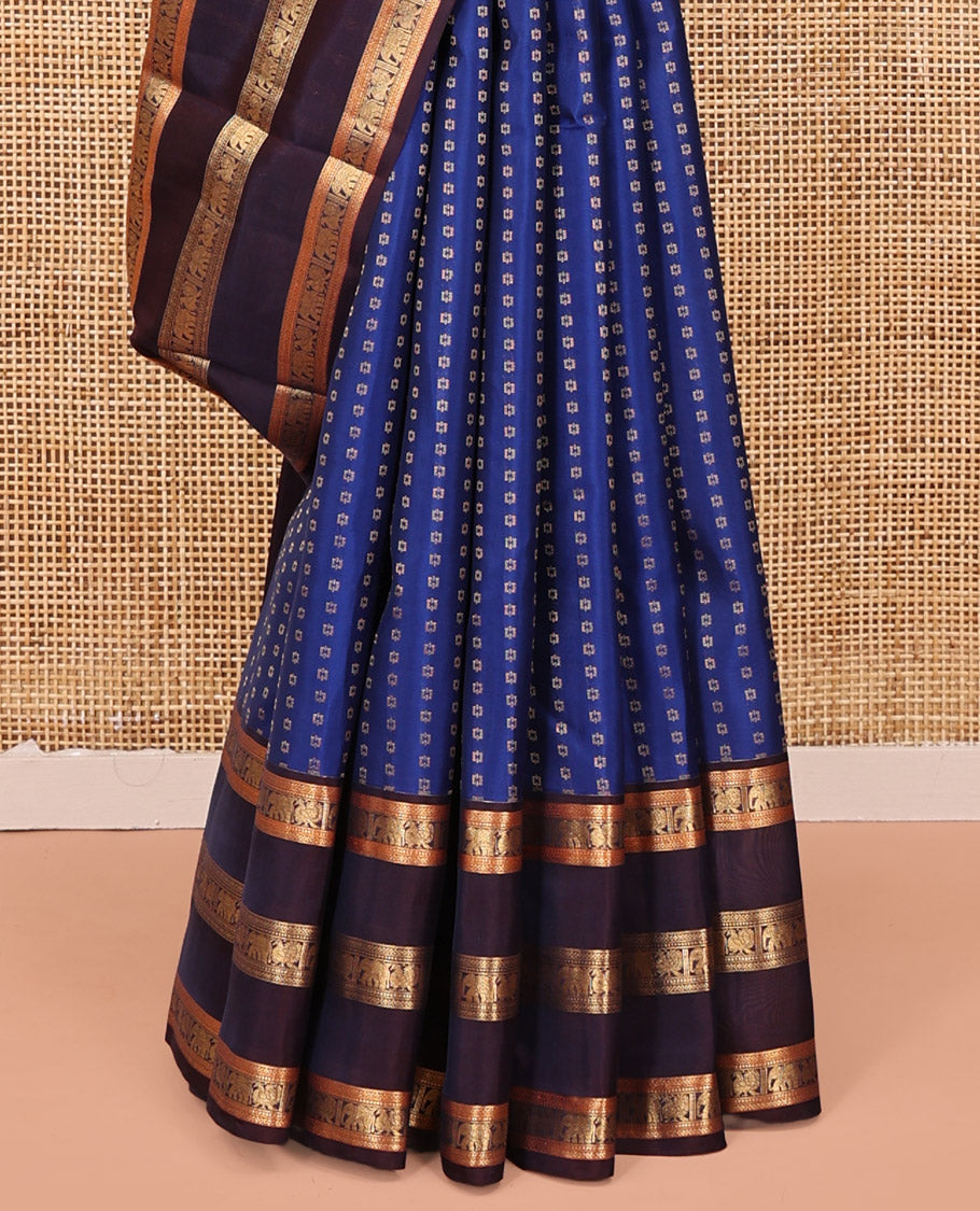 Blue Vasundhara Lite Silk Mix Saree, Richly Detailed with Zari Buttas All Over Its Body, Complemented by Contrast Varisai Pettu Border of Mayil and Yaanai Designs, Grandly Decked Up Pallu and Paired with a Contrast Blouse