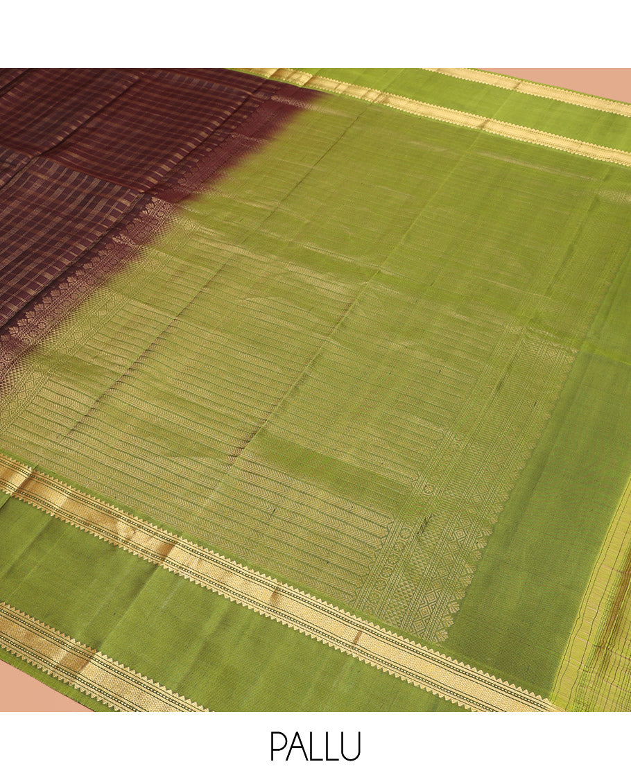 Brown Vasundhara Silk Saree Adorned with Zari Checks, Highlighted by a Contrast Rettai Pettu Border of Rekku, Muthu, Banaras, and Mayil Kann Designs, a Zari-Woven Pallu of Kathir Designs, and Paired with a Contrast Blouse