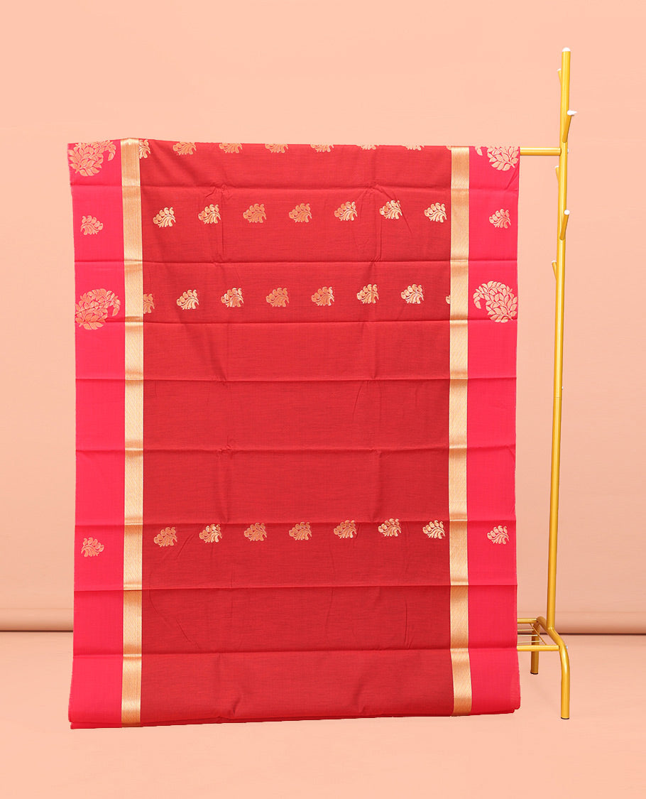 Red Semi-Silk Cotton Saree, Richly Detailed with Zari Buttas All Over Its Body, Complemented by a Contrast Paisley Zari Design Border, Pallu of Floral Design, and Paired with a Contrast Blouse