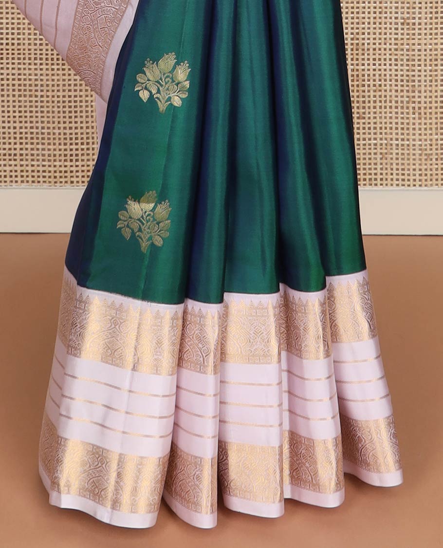 Green floral butta silk saree, contrast border of rekku,rudraksham,floral,banaras & mayil, & ogee patterned pallu