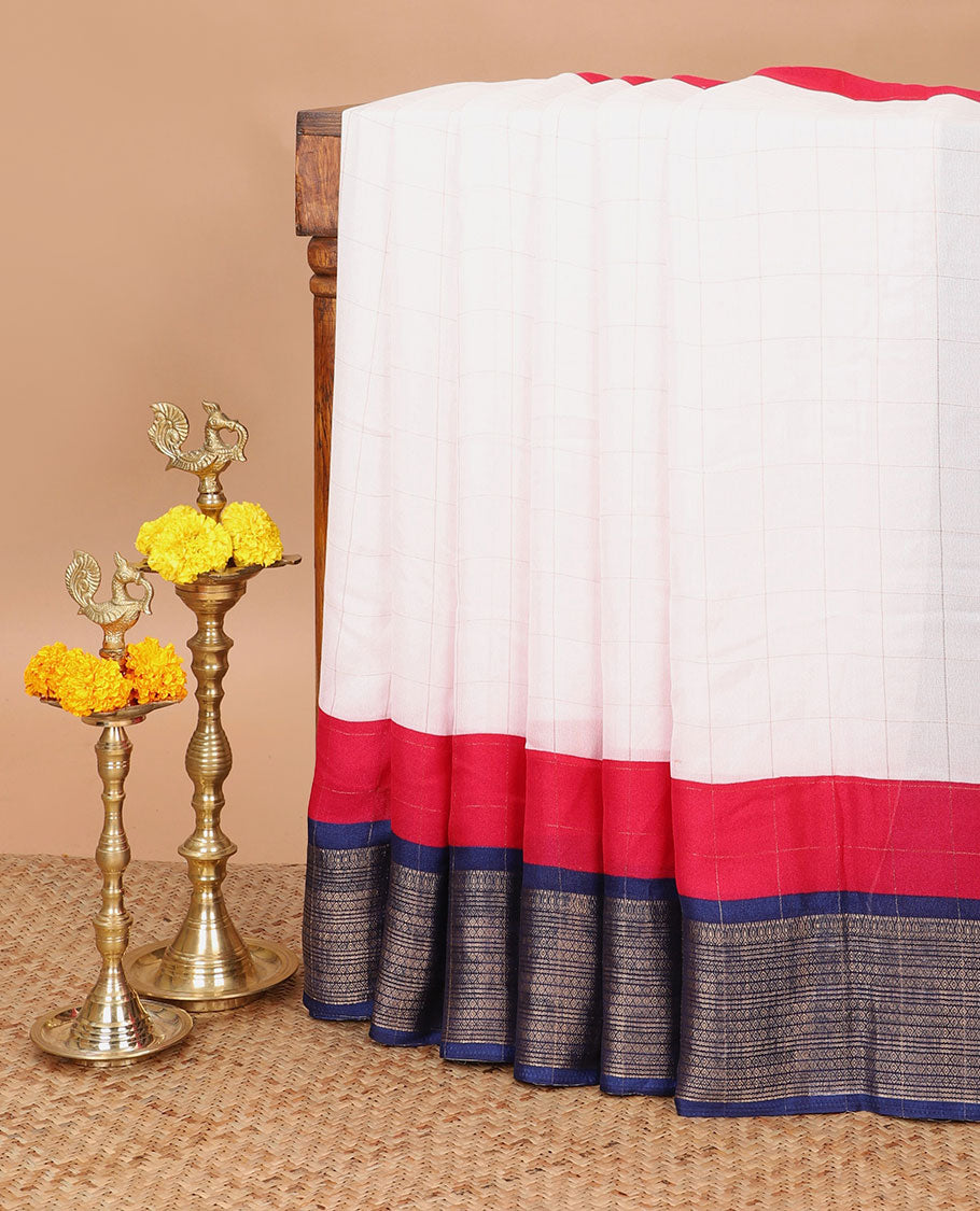 White with navy blue zari checked design moss georgette saree with contrast zari jacquard border & printed pallu along with checked blouse